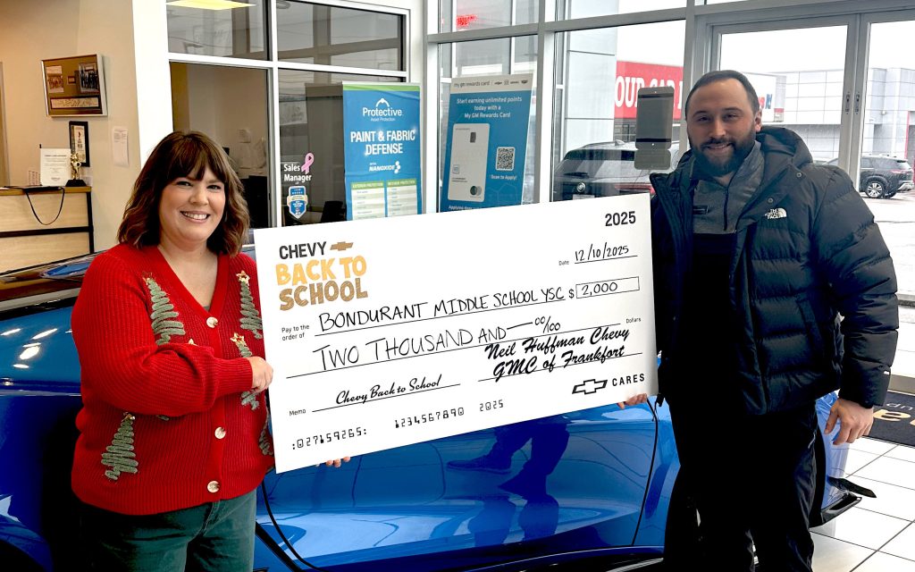 Bondurant Middle School check presentation with school and dealership representative.