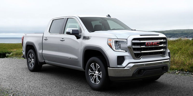 Whie 2020 GMC Sierra 1500 standing near seashore