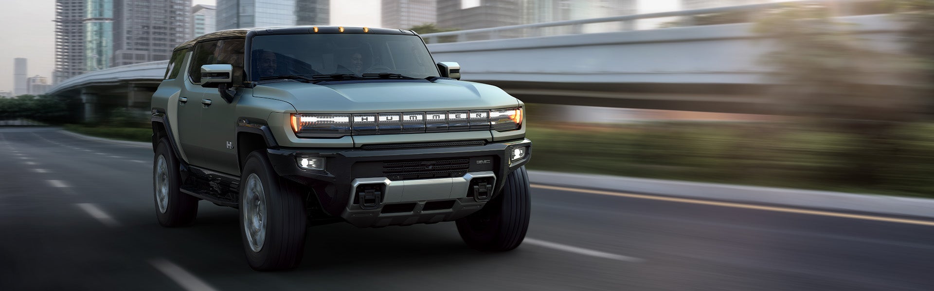 GMC hummer EV running on road